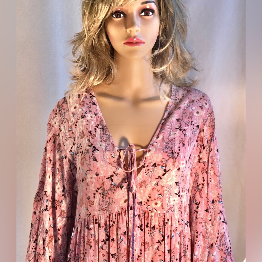 Bohemian dress, pink w/ tiny floral print, deep lace-up V neck, bell sleeves. S